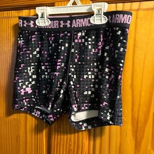 Women’s size small (?) HeatGear athletic shorts pink/gray color by Under Armour